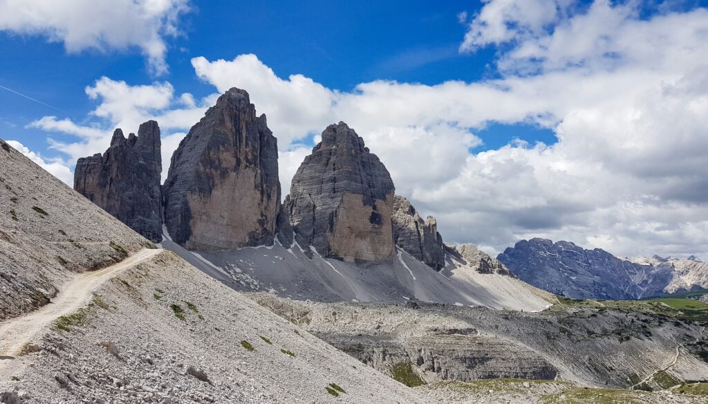 Spectacular scenic view of three rocky mountain peaks at Tre Cime di Lavaredo in Italy.